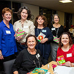 WI members holding gifts