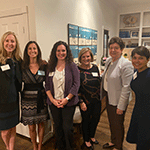 Group of six WI members at an in-home happy hour